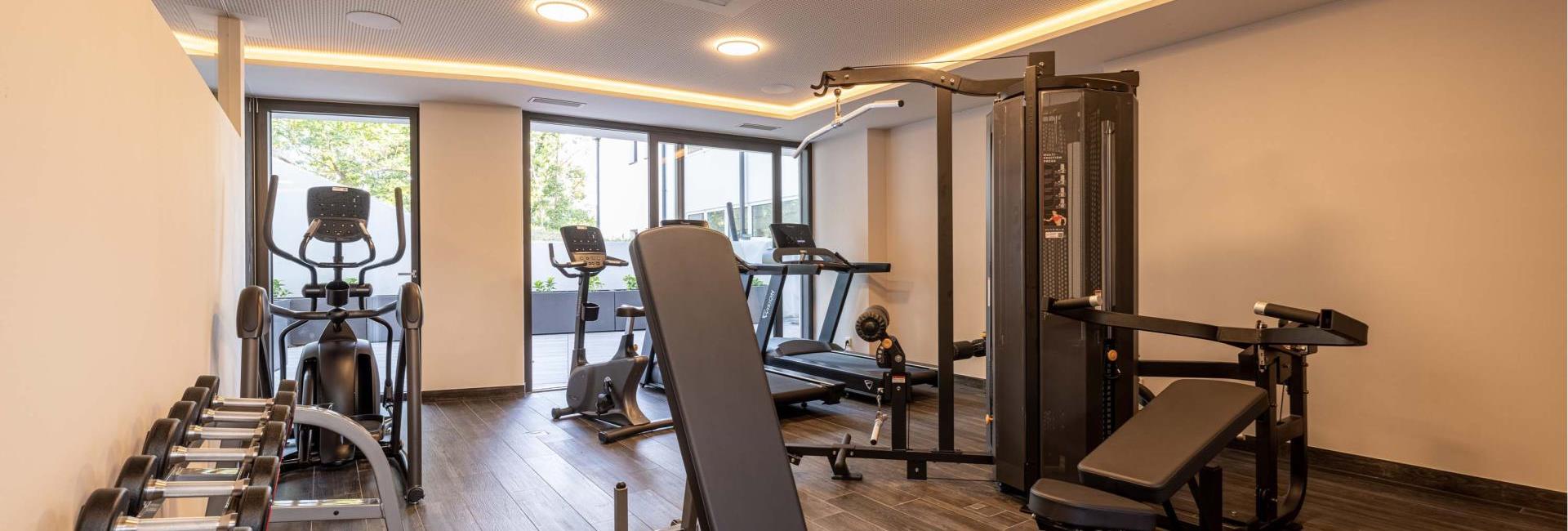 Fitness and exercise room with wellness trainer