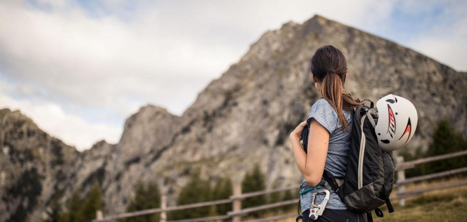 A woman is enjoying the panorama in summer