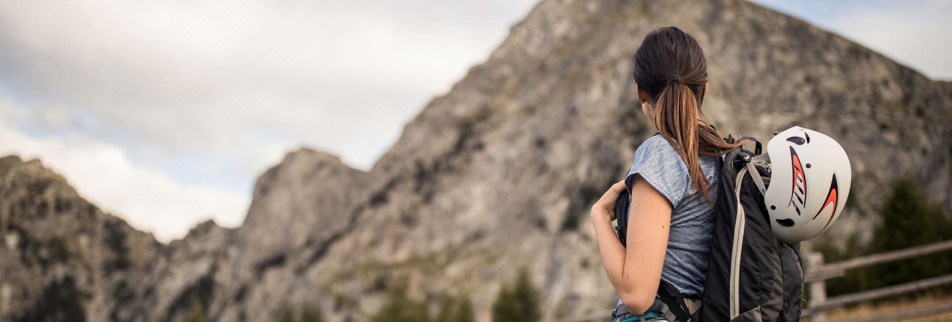 A woman is enjoying the panorama in summer